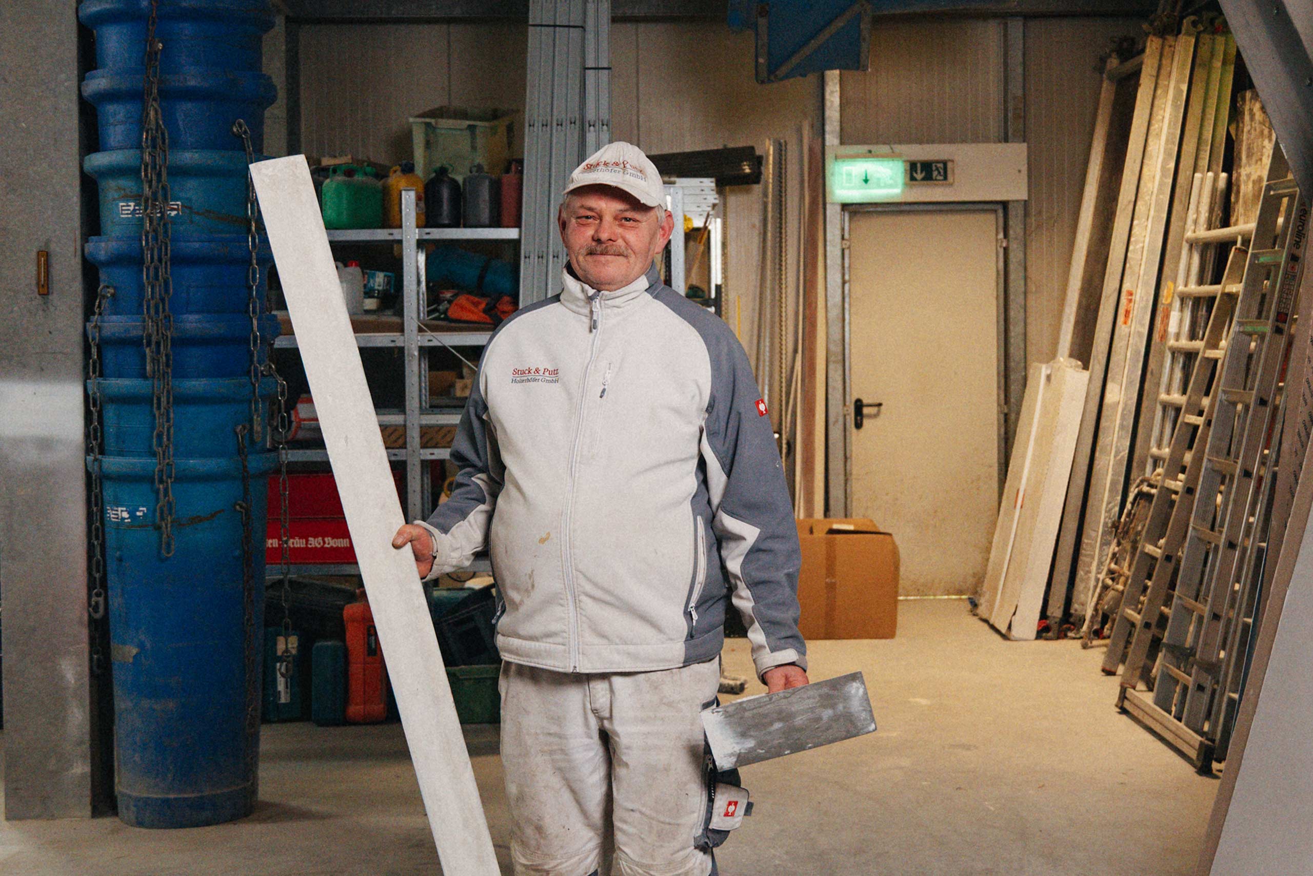 Porträtbild eines Mitarbeiters von Stuck & Putz